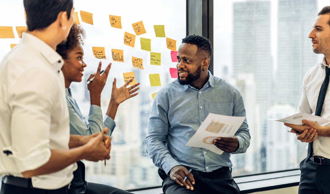 Group of business meeting and discussing strategy with startup project analysis finance,management.Success business people plan and brainstorm,marketing,idea,research,organization in office.Teamwork